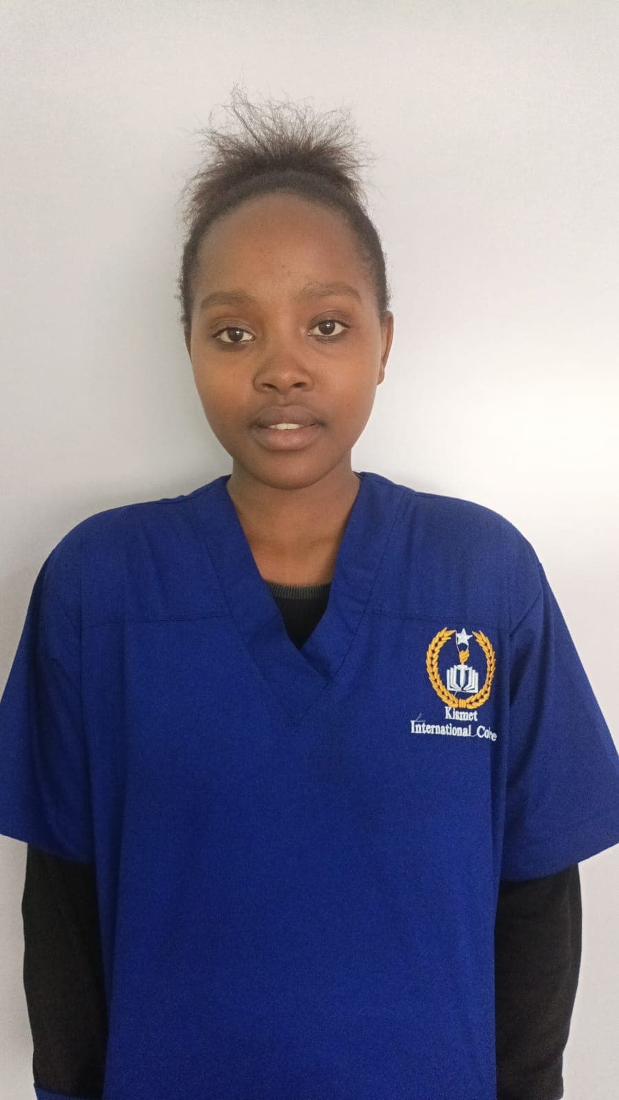 Passport photo of Glory Karimi, caregiver in Thika, Nairobi