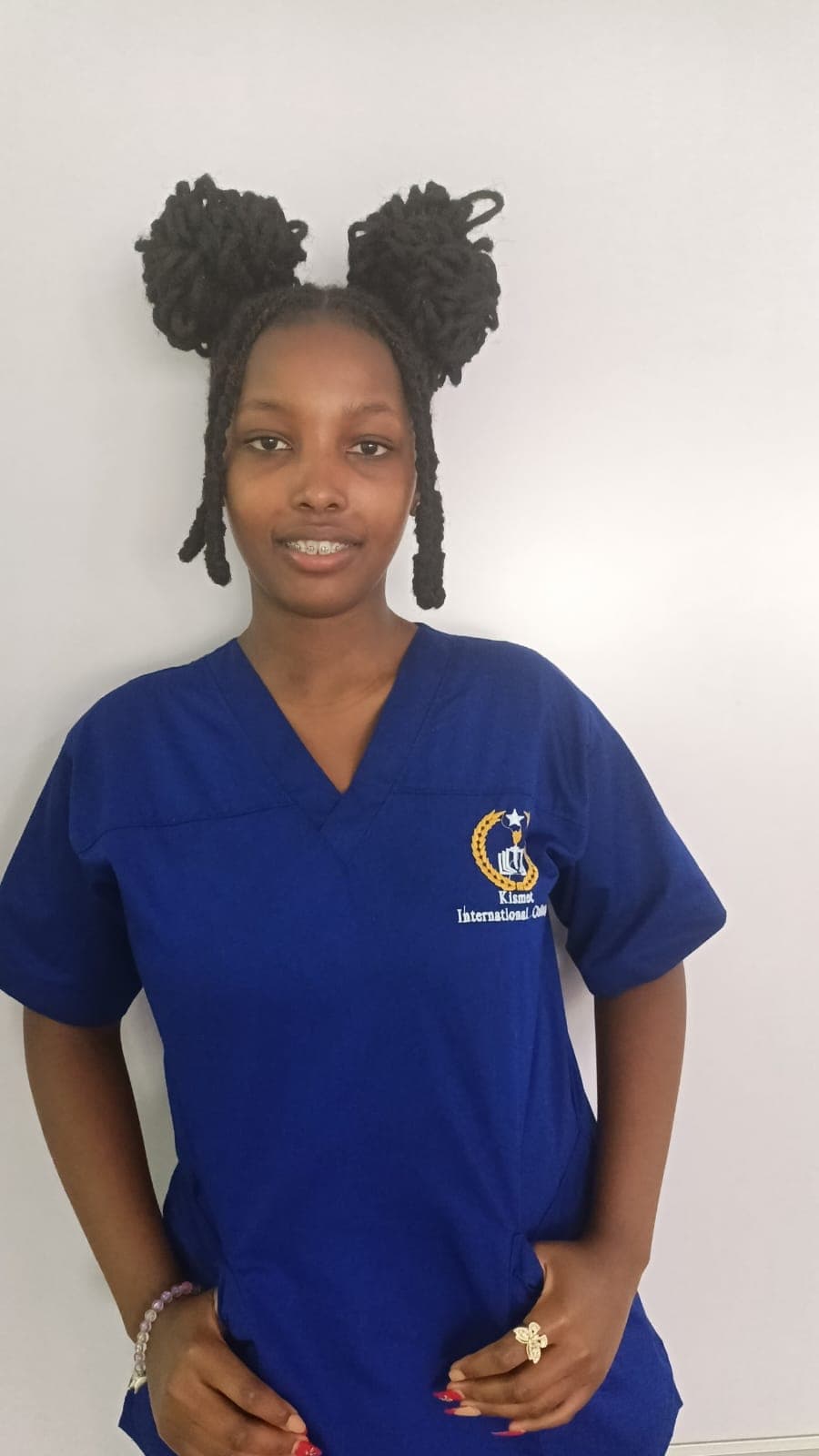 Passport photo of Mary Ann Mwende, caregiver in Thika, Nairobi
